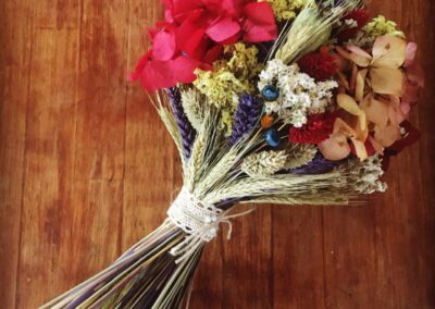 A multicolor bouquet, made with several dried and preserved flower types